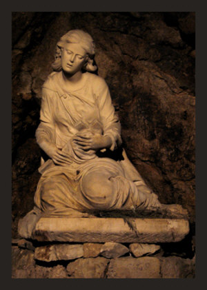 Statue of sad Mary Magdalene